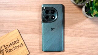 OnePlus 12 on a table, face-down